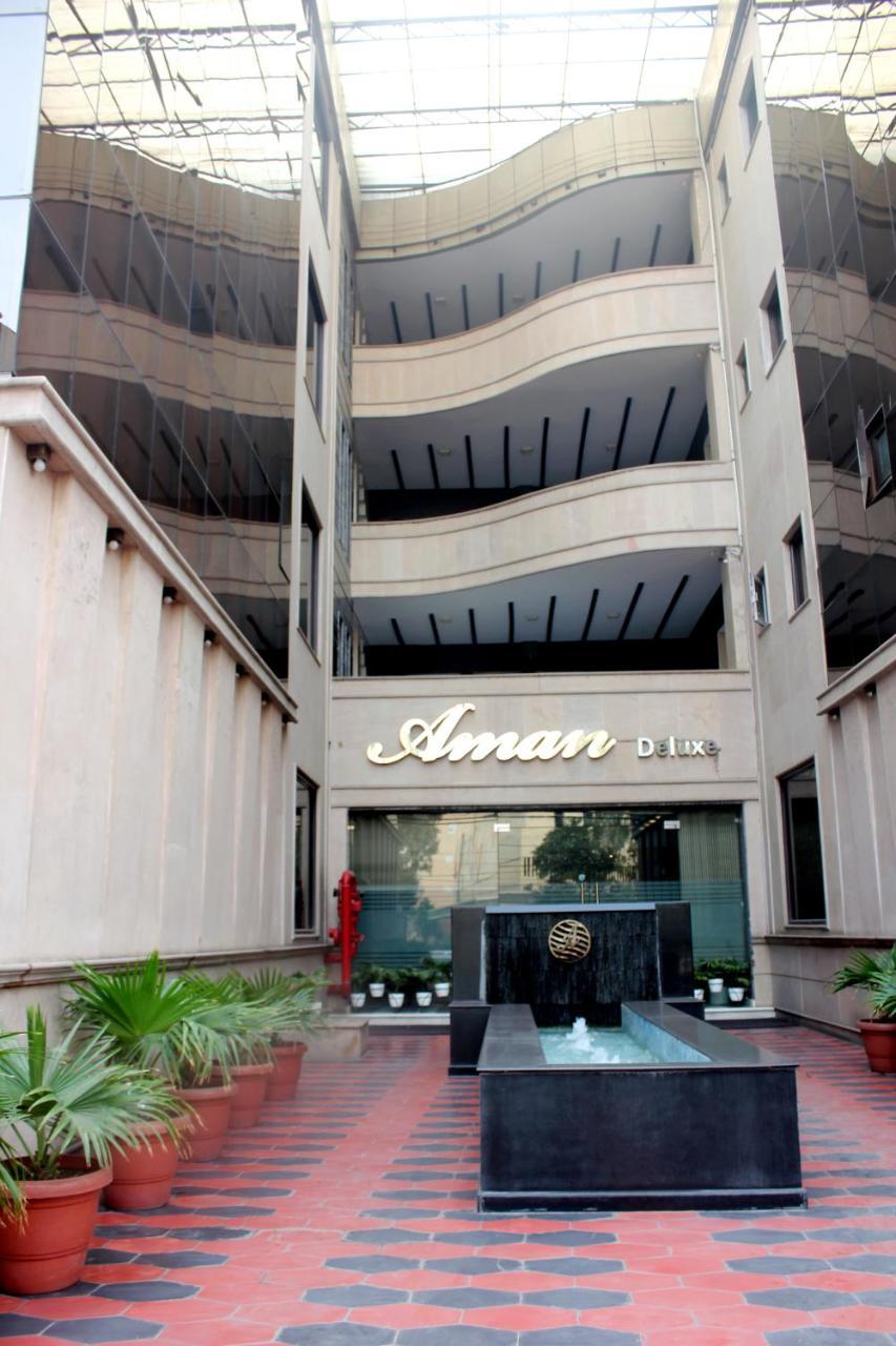 Aman Deluxe Hotel New Delhi Bagian luar foto