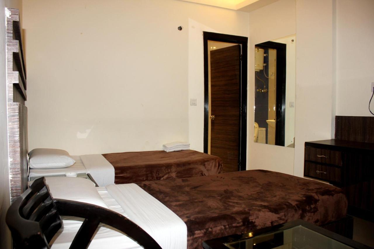 Aman Deluxe Hotel New Delhi Bagian luar foto
